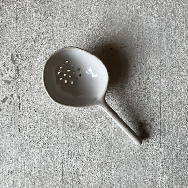 Cream Stoneware Strainer Spoon